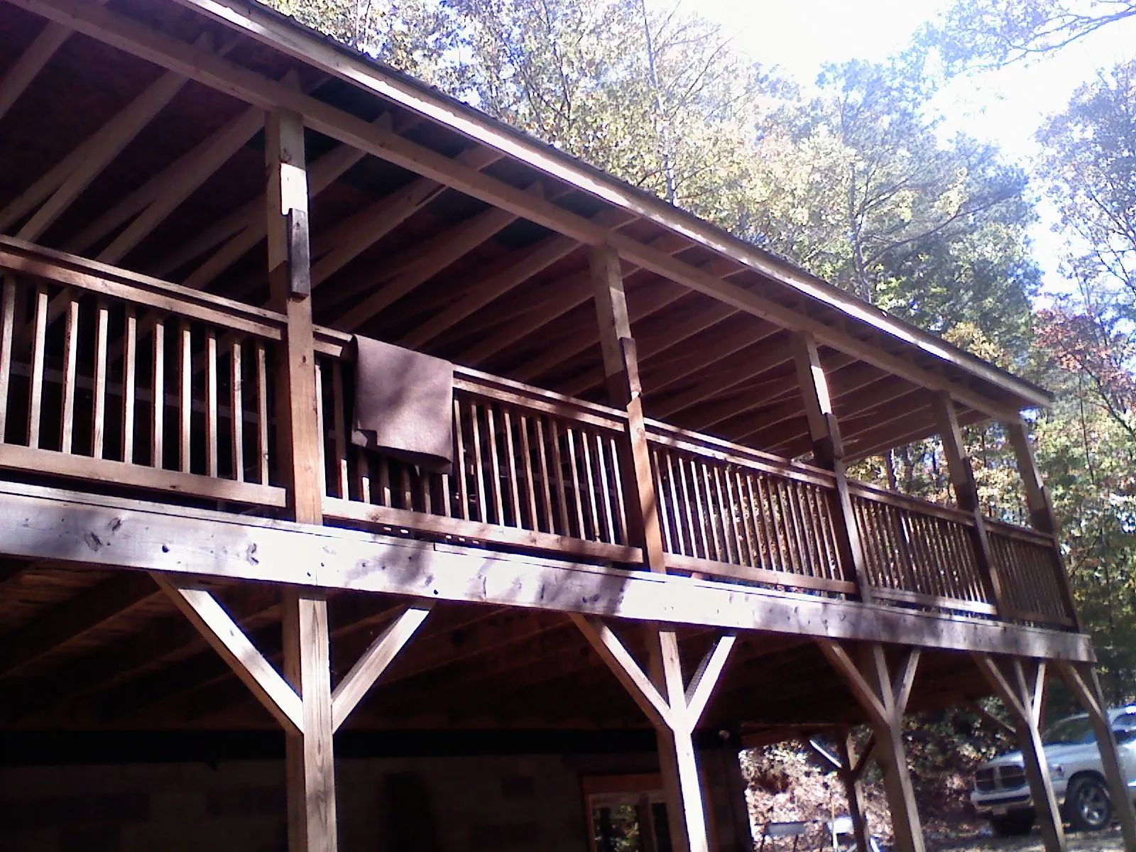 Timber framing under a new elevated porch and deck — Roof Leak Repair in Renville by Roofing Brothers